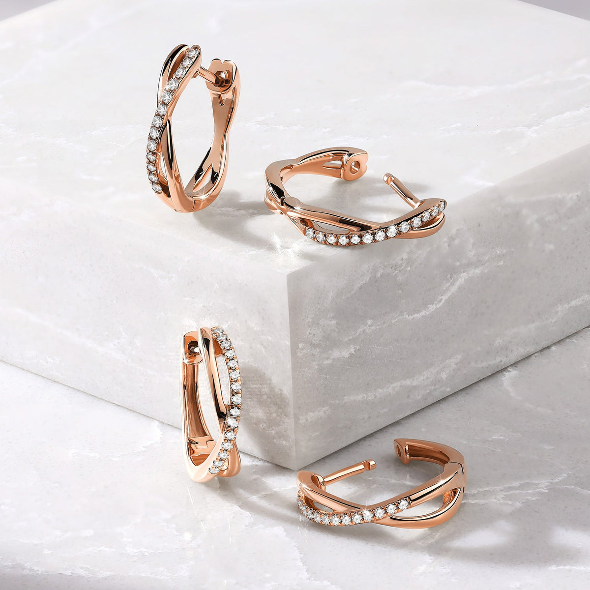 Twisted Radiant Huggie Hoops