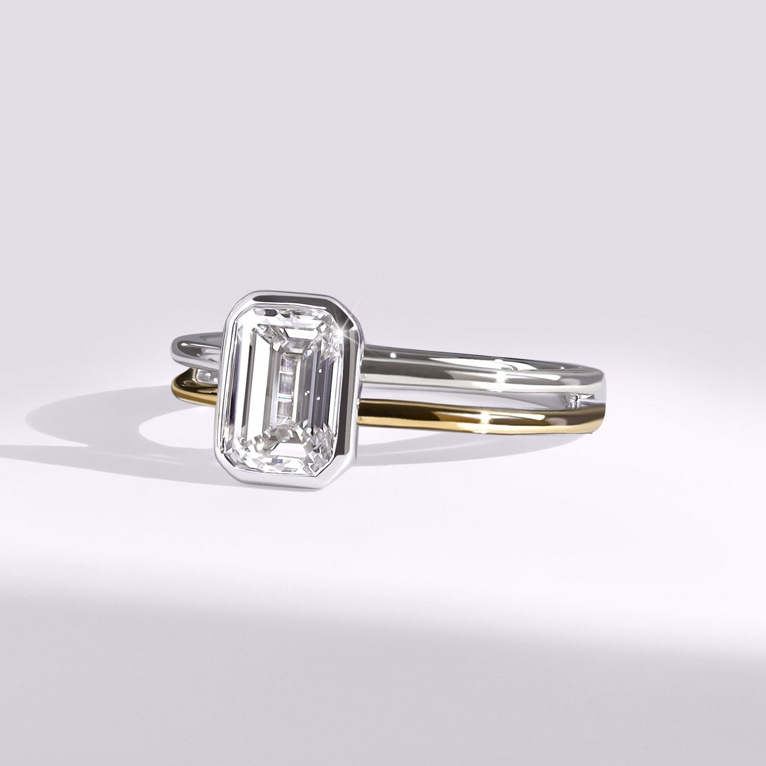 Coupled Emerald Bezel Solitaire Ring