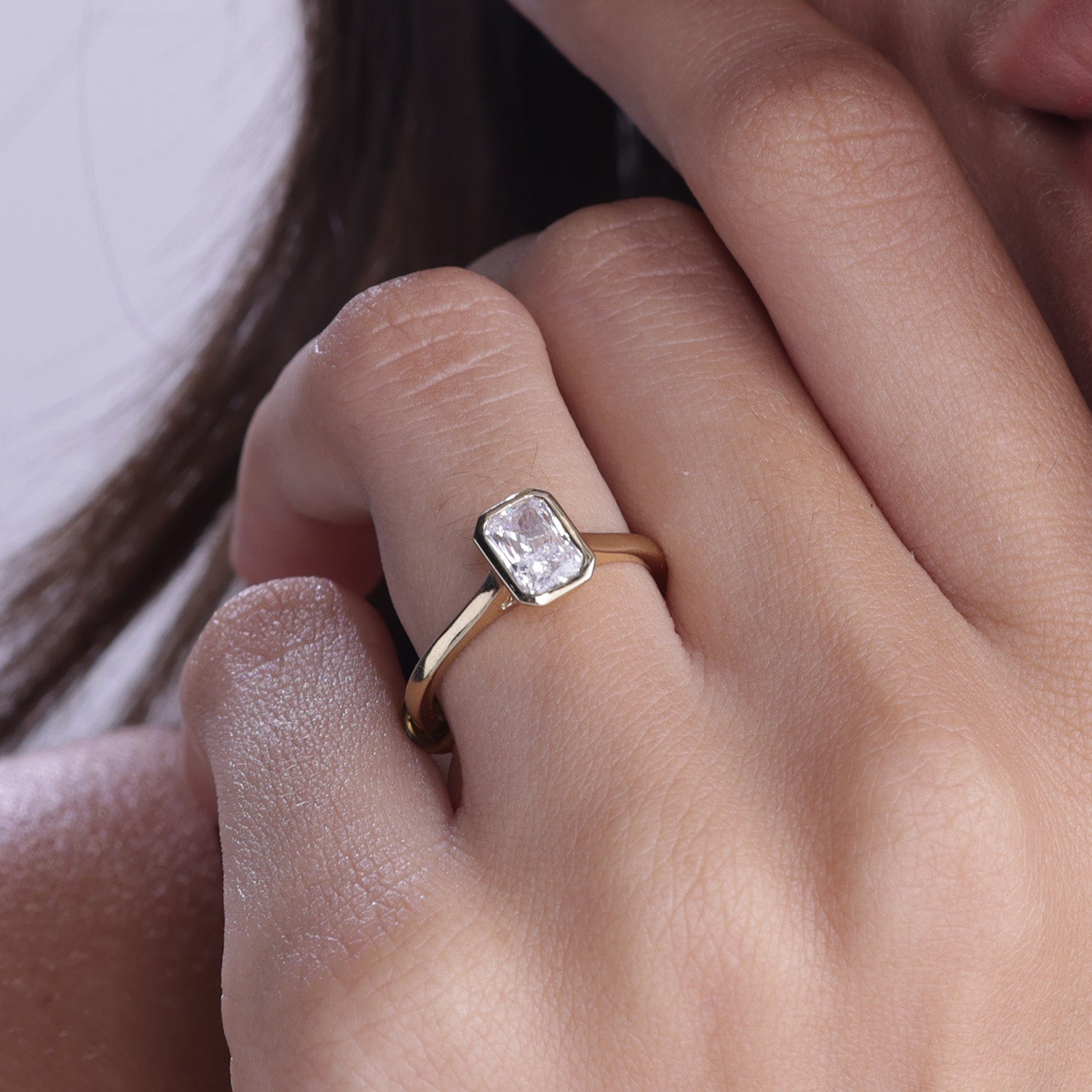 Gold Emerald Cut Bezel Ring
