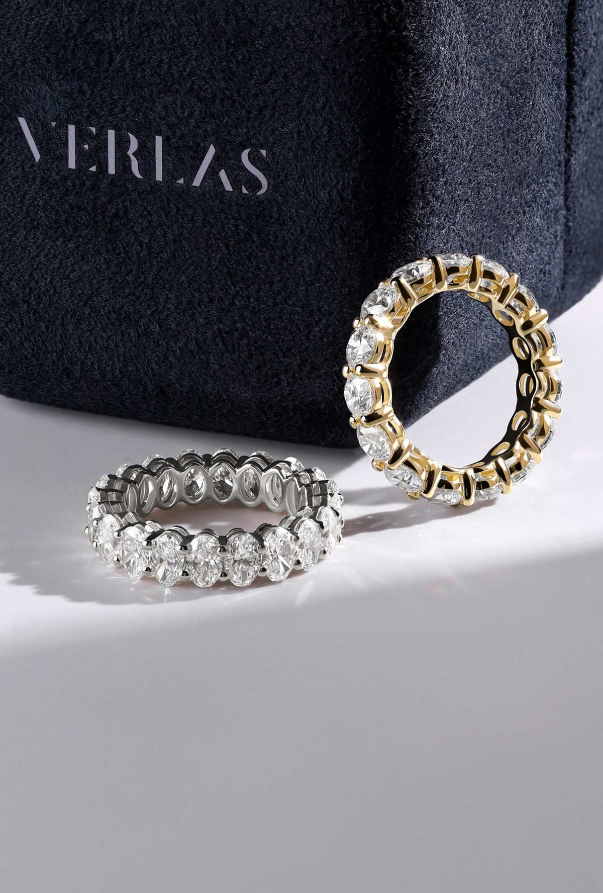 Verlas diamond engagement rings and bands for him and her. 