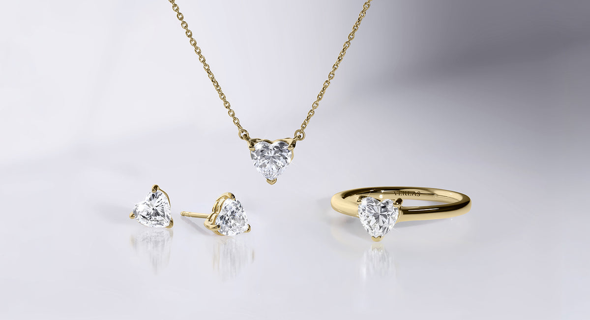 Verlas Heart Solitaire set featuring a necklace, earrings, and ring crafted in hallmarked gold with certified lab-grown diamond. 