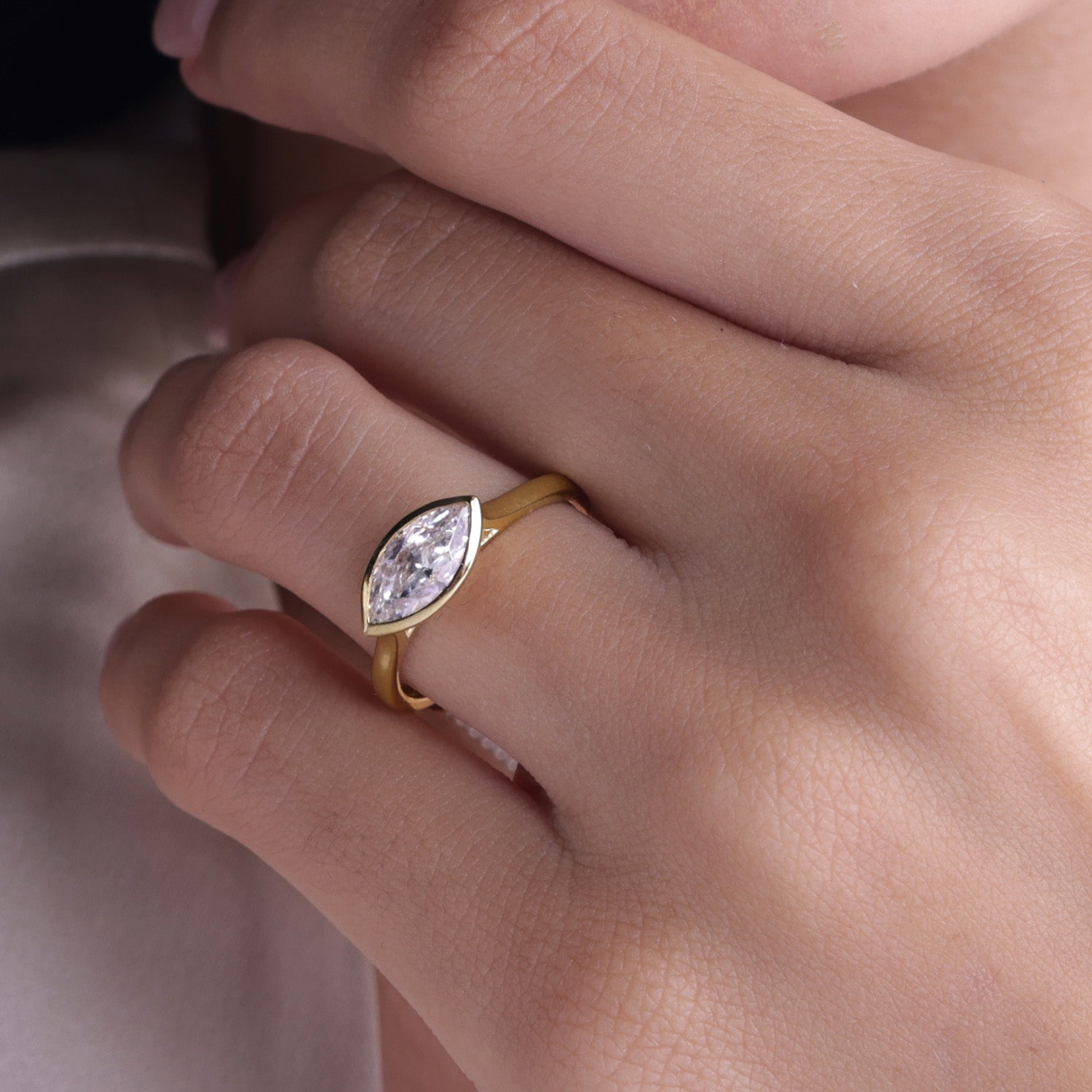 Marquise East-West Bezel Ring