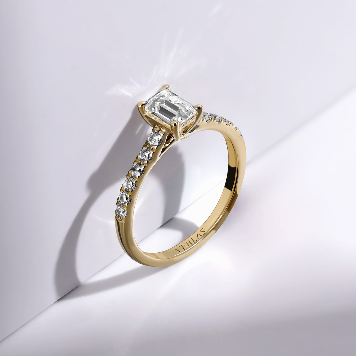 Emerald Four-Prong Solitaire Ring
