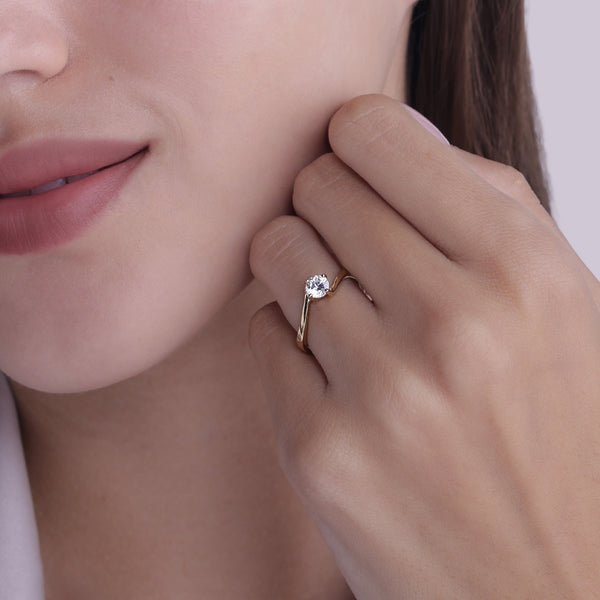 Four Prong Solitaire Twisted Band Ring